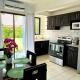 Charming Condo Orchidea, Coco (Foto 4)