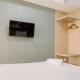 Best Comfy and Modern Studio at Baileys Apartment By Travelio, Tangerang - Photo 2