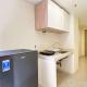 Homey and Minimalist 2BR at Meikarta Apartment By Travelio, Cikarang - Fotografie 10