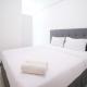 Compact and Homey 2BR at Benson Supermall Mansion Apartment By Travelio, Surabaja - Fotografie 1