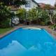 Apartment 55 m2, sunny garden & pool in Villa 1905