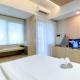 Modern Look Studio at Gateway Park LRT City Jatibening Apartment By Travelio, Bekasi - Fotografie 3