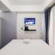 Modern Studio Room Apartment at Grand Asia Afrika By Travelio, Bandung - Fotografie 4