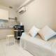 Modern 2BR at Mekarwangi Square Cibaduyut Apartment By Travelio Bandung - Fotografie 6