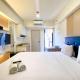 Modern Look Studio at Meikarta Apartment By Travelio Cikarang - Fotografie 3