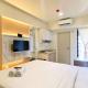 Modern Look Studio at Meikarta Apartment By Travelio Cikarang - Fotografie 4