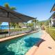 Whitsunday Beachfront Apartment on Coral Esplanade, Cannonvale - Fotografie 1