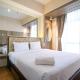 Nice and Comfortable Living 1BR at Grand Sungkono Lagoon Apartment By Travelio