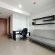 Nice and Comfy 1BR at Dago Suites Apartment By Travelio, Bandung - Photo 4