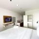 Minimalist Studio at Enviro Apartment By Travelio, Cikarang - Foto 8