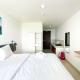 Restful and Comfy Studio Enviro Apartment By Travelio, Cikarang - Foto 1