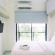 Studio with Cozy Design at Sky House BSD Apartment By Travelio Tangerang - Photo 1