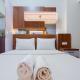 Scenic Studio Apartment at Vida View Makassar By Travelio, Pampang - Fotografie 2