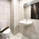 Simply Look Studio at 21st Floor De Prima Apartment By Travelio, Medan - Foto 3