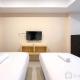 Simply Look Studio at 21st Floor De Prima Apartment By Travelio, Medan - Foto 2