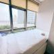 2BR with City and Pool View La Riz Supermall Mansion Apartment By Travelio Surabaya - Foto 2
