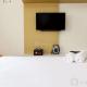 Simple and Comfort Studio at Riverview Jababeka Apartment By Travelio