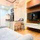 Cozy and Homey Studio at Vasanta Innopark Apartment By Travelio, Cikarang - Fotografie 5