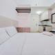 Comfy Studio at Poris 88 Apartment By Travelio Tangerang - Photo 1