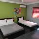 Deluxe Twin Beds in Royal Blue Guest House and Bar Lome