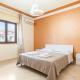 GuestHost - Apartment with Terrace in Aci Catena, Aci Catena