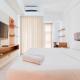 Restful Studio Room at Akasa Pure Living BSD Apartment By Travelio Tangerang - Fotografie 1