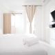 Compact and Tidy Studio at Puncak Dharmahusada Apartment By Travelio, Plosobegem (Foto 2)