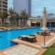 Manzil - 2BR Home with Waterfront Views in Palm, Dubaj - Fotografie 1