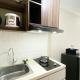 Modern Look and Tidy Studio Gateway Park LRT City Jatibening Apartment By Travelio, Bekasi - Fotografie 6