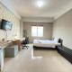 Simply Executive Studio at Pinewood Apartment By Travelio Sumedang - Foto 1