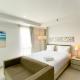 Cozy and Nice Studio at Azalea Suites Apartment By Travelio, Cikarang - Fotografie 4