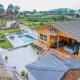 Bird's Nest by The StayCationer, Rājpur - Foto 1