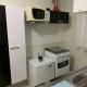 Kitnet202 centro, com linda vista janela, tv smart, モンテス・クラロス - 写真 2