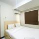 Basic 2BR at Lagoon Bekasi Town Square Apartment By Travelio - Foto 2
