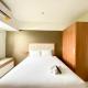 Full Furnished with Simply Look Studio Room Mont Blanc Bekasi Apartment By Travelio