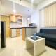 Comfortable 2BR at 25th Floor Meikarta Apartment By Travelio, Cikarang - Fotografie 4