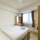 Comfortable 2BR at 25th Floor Meikarta Apartment By Travelio, Cikarang - Fotografie 2