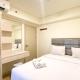 Serene Designed 2BR at Meikarta Apartment By Travelio, Cikarang - Fotografie 1