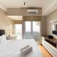 Warm and Cozy Studio at Vasanta Innopark Apartment By Travelio Cikarang - Foto 2
