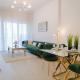 Elegant 1BR Retreat with Rooftop Pool in JVC By ĀYA Boutique, Dubaj - Fotografie 2