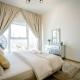 Elegant 1BR Retreat with Rooftop Pool in JVC By ĀYA Boutique, Dubaj - Fotografie 4
