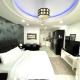 Deluxe room with king bed and Balcony at Kandi Palace