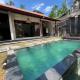 Pis Bolong Ubud Villa - Photo 8