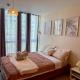 Cozy 1BR Condo with Uptown Mall View - BGC Zen Suite, Manila - Fotografie 5