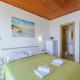 Rooms Sani - Double Room with Terrace and Sea View S1, Брела (фото 7)