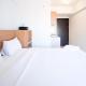 Simple and Comfortable Studio Apartment at Suncity Residence By Travelio, Sidoarjo - Photo 4