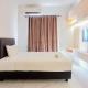 Relaxing Studio at Sky House Alam Sutera Apartment By Travelio Tangerang - Foto 1