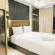 Warm Studio with Access to Mall at Anderson Supermall Mansion Apartment By Travelio Surabaya - Foto 2