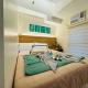 Staycation in Mckinley walking distance to Venice Mall, Manila - Foto 4