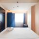 Tranquil Designed 2BR at Braga City Walk Apartment By Travelio Bandung - Fotografie 3